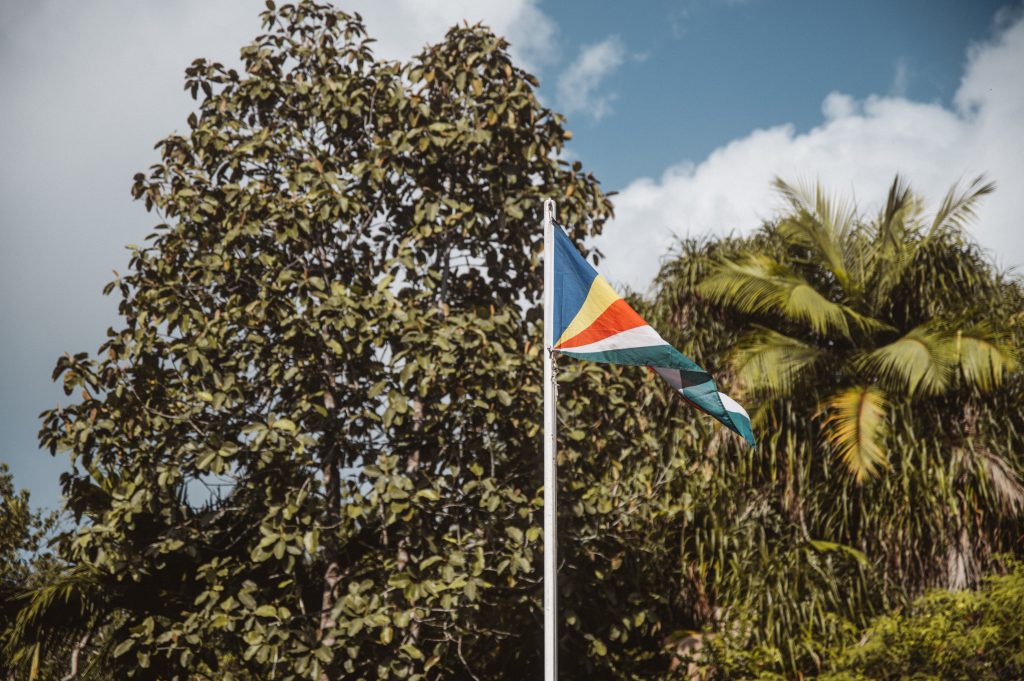 Romantic couple walking on tropical beach Seychelles Mahé